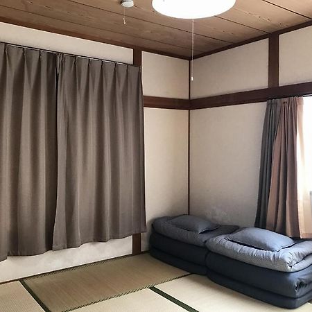 Golden Mile Apartment Amami Exterior foto