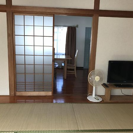 Golden Mile Apartment Amami Exterior foto