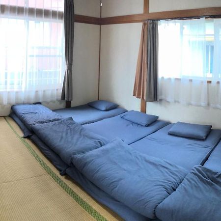 Golden Mile Apartment Amami Exterior foto