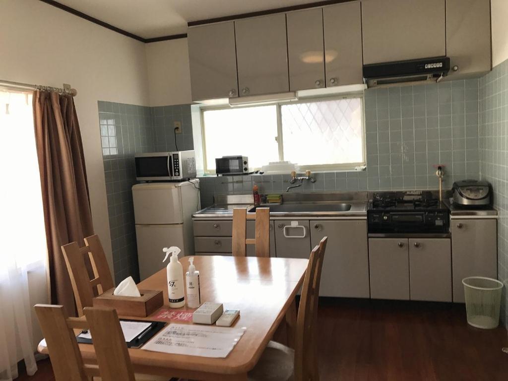 Golden Mile Apartment Amami Exterior foto